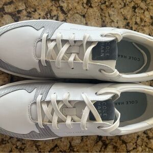 Cole Haan women’s White and Silver Leather Sneakers